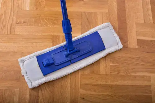 Close-up of hardwood floor being cleaned by Heaven’s Best in San Diego